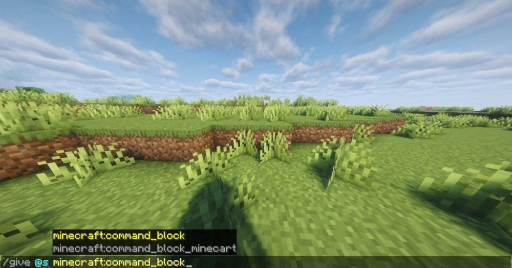 Dùng lệnh để nhận và đặt khối Command Block